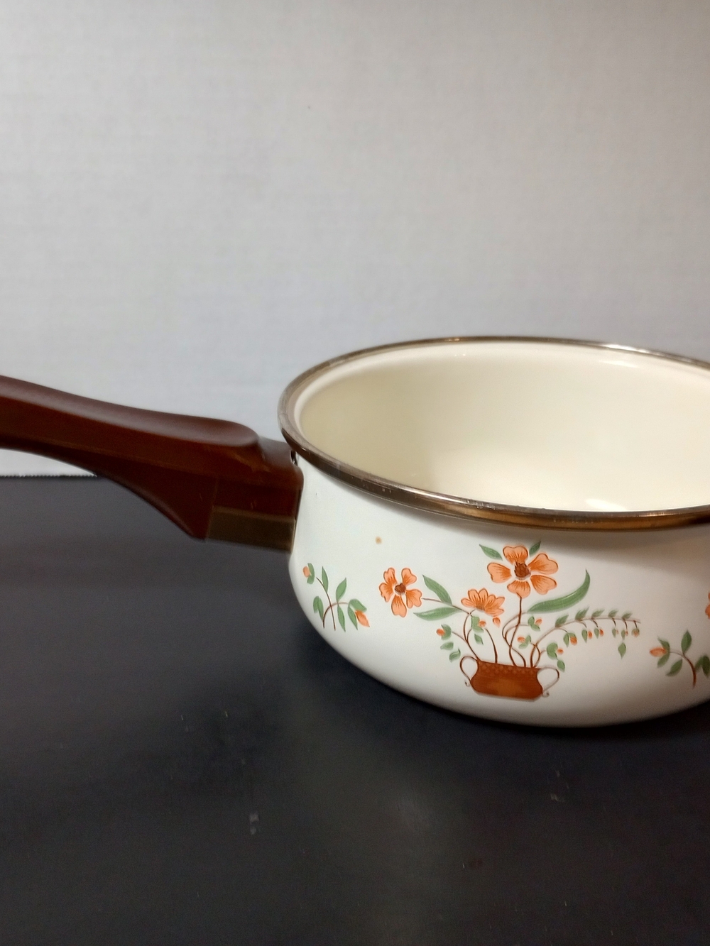 Cream Enamel Saucepan with Orange Floral Motif and Brown Handle